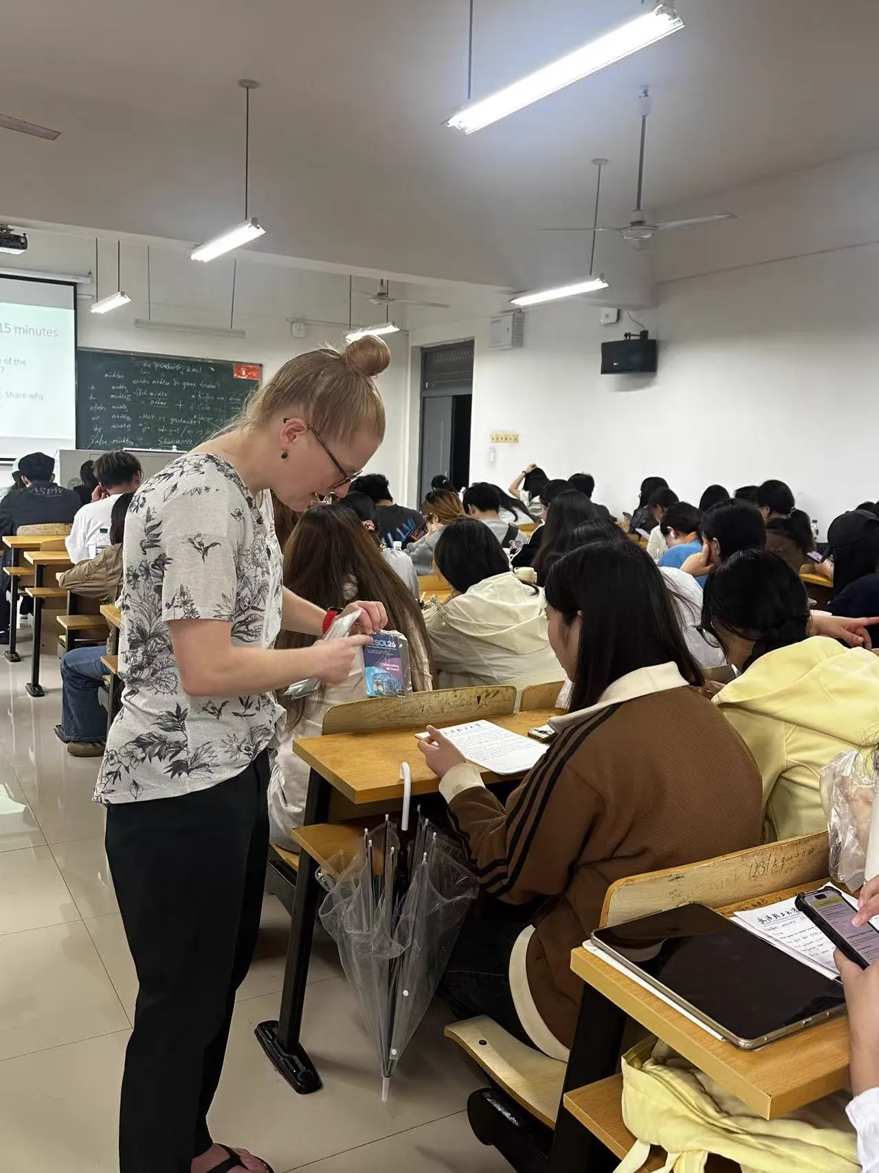 An SUU instructor leading an English writing class in Wuhan