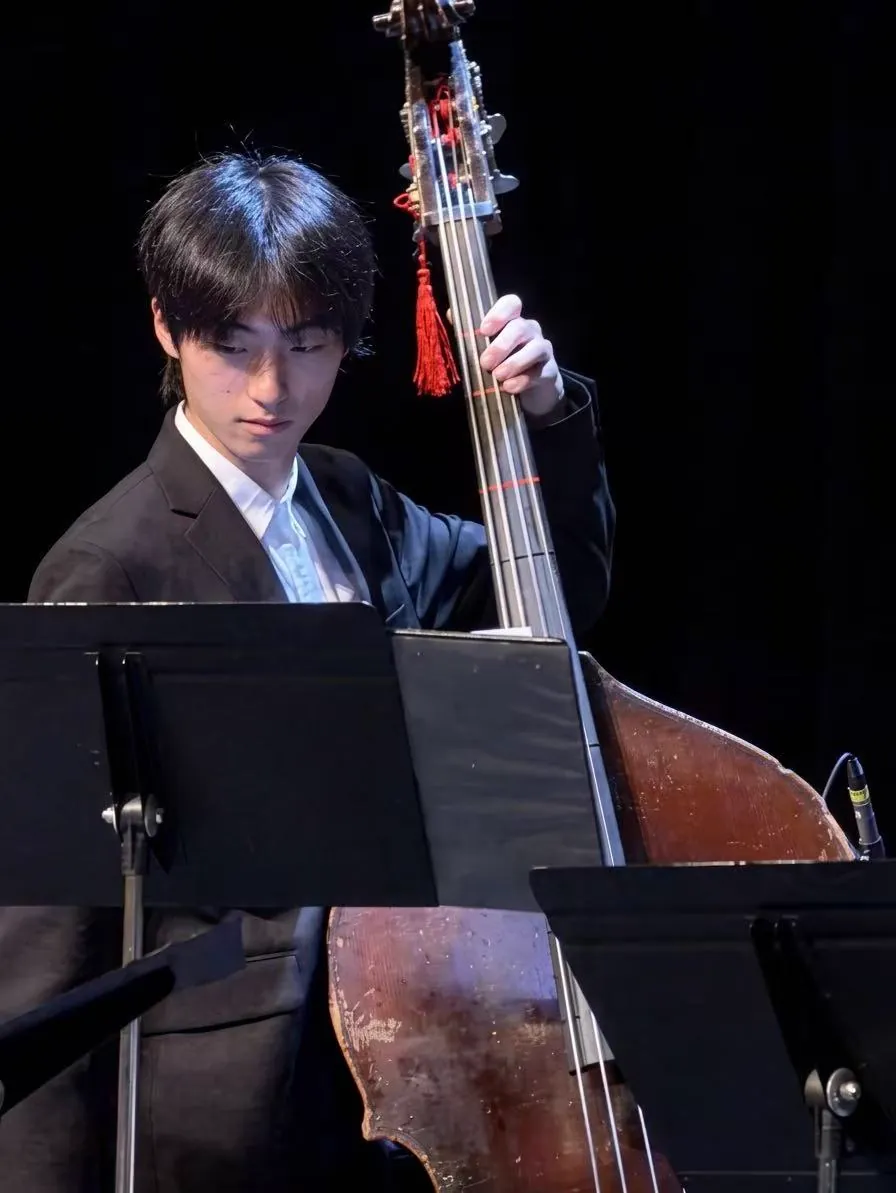 Mukun Sun performing upright bass at SUU Jazz Fest